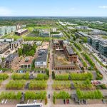Aerial view of Milton Keynes office buildings and roads.
