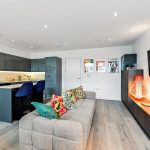 Modern open-plan kitchen and living room interior.