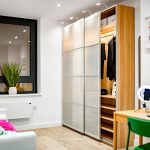 Modern room with wardrobe, desk, and chair