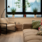 Modern living room with plants and cosy seating