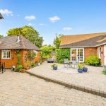 Charming brick house with sunny courtyard garden.