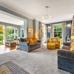 Spacious living room with garden view
