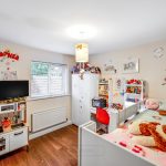 Colourful child's room with toys and decoration.