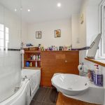 Modern bathroom with sink and bathtub