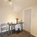 Dining area with table and chairs.