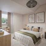 Modern bedroom with desk and artwork