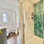 Modern bathroom with shower and toilet