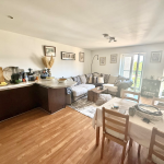 Spacious modern open-plan kitchen and living room.