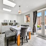 Bright dining room with table and patio doors