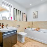 Modern bathroom with bathtub and sink
