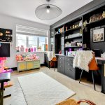Modern home office with toys and musical instruments.