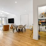 Modern living room with dining area and pantry