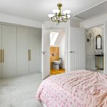 Bedroom with ensuite bathroom and fitted wardrobe