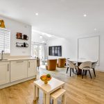 Modern open-plan kitchen and dining area.
