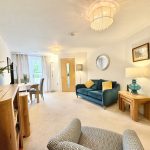 Cosy living room with modern furniture and decor.