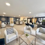 Modern lounge area with chairs and tables