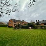 Countryside house with large grassy garden