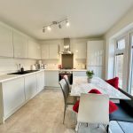 Modern kitchen with marble dining table