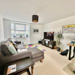 Modern living room with sofa and TV