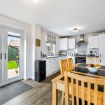Modern kitchen-diner with garden view