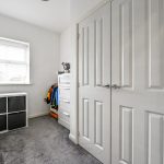 Minimalist room with wardrobe and storage cubes
