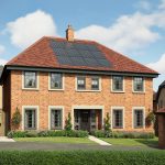 Modern brick house with solar panels on roof