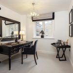 Elegant home office with desk and chess set.