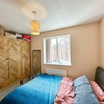 Cosy bedroom with wardrobe and double bed