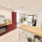 Modern kitchen with dining area view