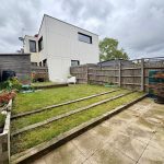 Modern house with garden and patio area
