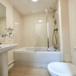Modern bathroom with bathtub and shower