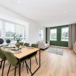 Modern open-plan dining and living room interior.