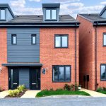 Modern red brick semi-detached houses for sale.