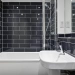 Modern bathroom with black tile design