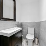 Modern bathroom with sink and toilet