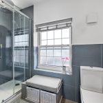 Modern bathroom with shower and toilet