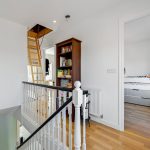 Loft ladder, bookcase, bedroom with loft bed.