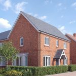 Modern suburban brick house with gabled roof.