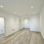 Modern empty room with wooden flooring