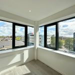 Cityscape view from modern glass windows