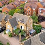 Aerial view of residential houses in a neighbourhood.