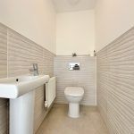 Modern bathroom with sink and toilet