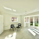Bright room with chairs and garden view