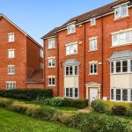 Modern red brick apartment building exterior