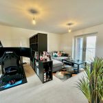 Living room with simulator and modern decor