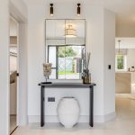 Modern hallway with console table and mirror.