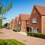 Modern brick houses on a sunny street