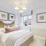 Modern bedroom with stylish decor and soft lighting.