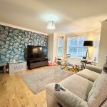 Cozy living room with toys and modern decor.