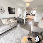 Modern cosy living room and kitchen area